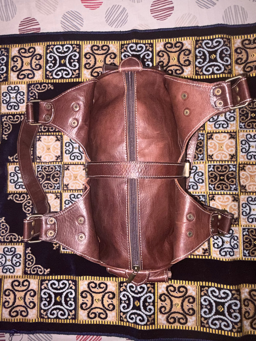 Cartera artesanal marroquí de cuero de cabra hecha a mano