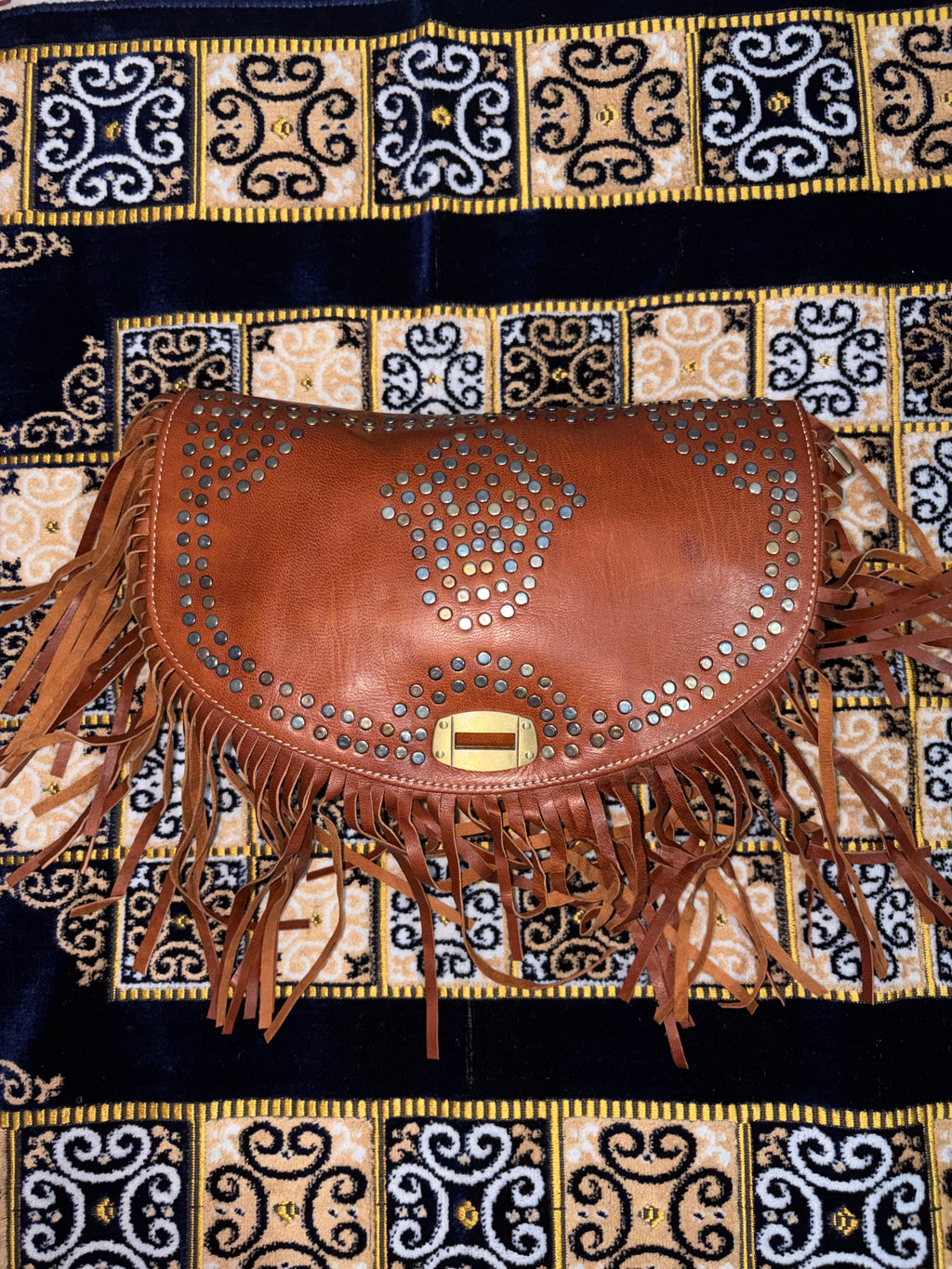 Bolso artesanal de cuero de cabra hecho a mano