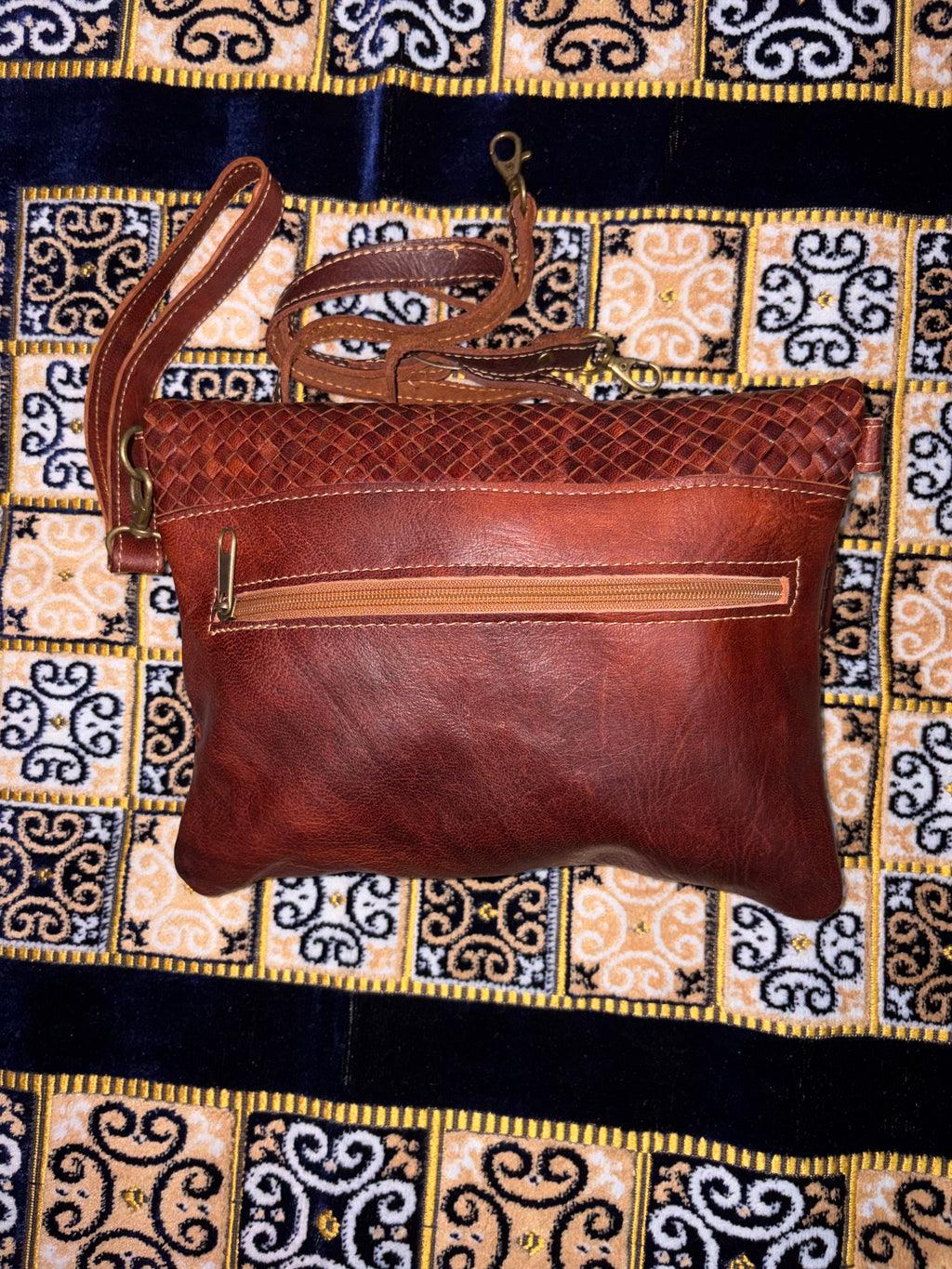 Cartera artesanal marroquí de cuero de cabra hecha a mano